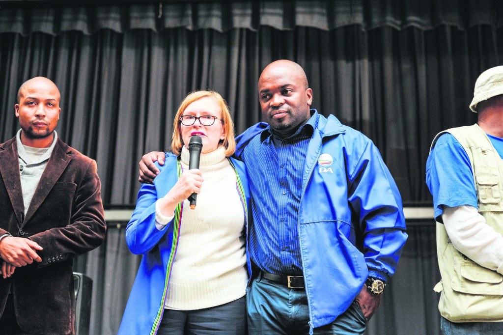 Hellen Zille and Solly Msimanga on stage after their meeting was inturupted, protestors from the Patriotic Alliance entered the Eersterust Civic Centre during a DA meeting, 15 June 2016, they came from Cape Town to disrupt the DA meeting, Pretoria. Picture: Jacques Nelles