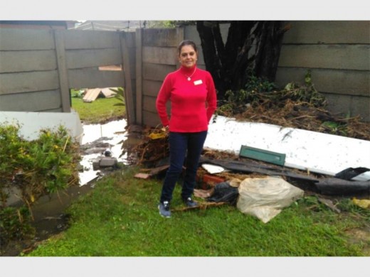 ON SCENE: Ward councillor Marina van Wyk lends her support at one of the damaged homes in Alberton. Picture Comaro Chronicle