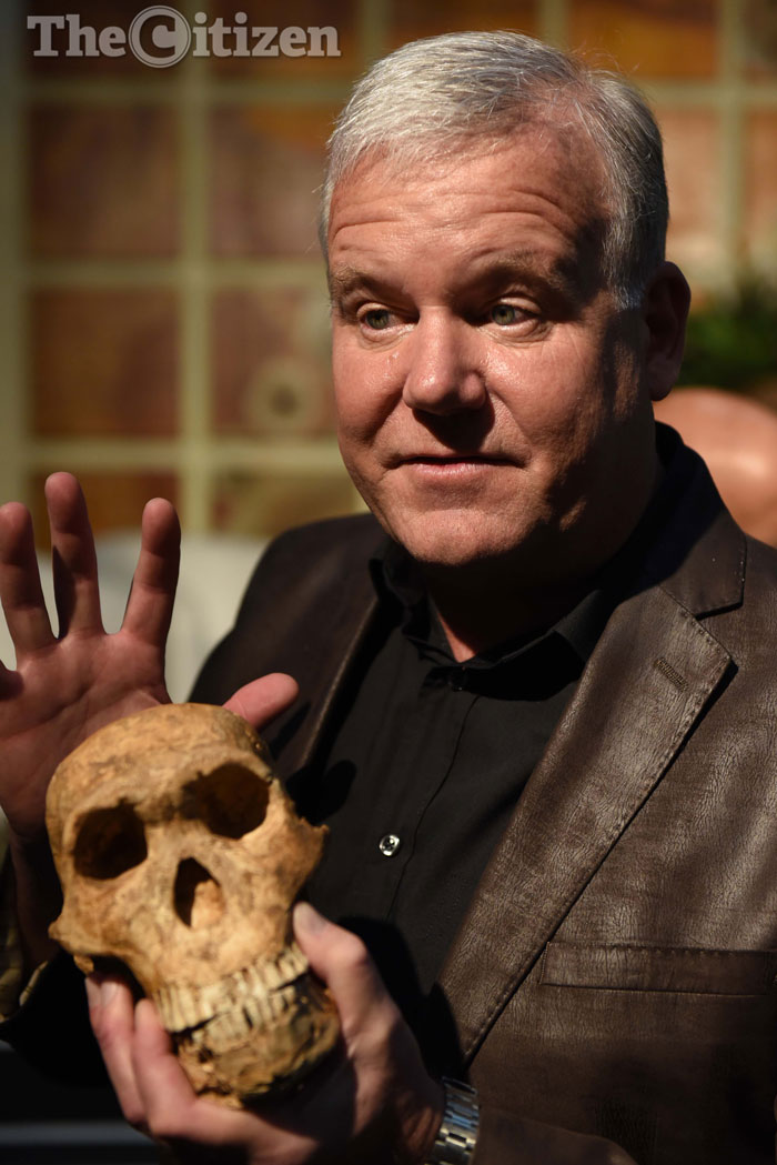 Professor Lee Berger with a copy of the skullof a newly found example of a Homo Naledi skeleton named Neo during a media event held at Maropeng, 9 May 2017 to announce more findings from the Rising Star cave system in which Homo Naledi was found a year and a half ago. The age of Homo naledi has been determined to be in the vicinity of 335 000-236000 years old, meaning that it is likely they roamed the earth in the vicinity of Homo Sapiens demonstrating for the first time that another species lived alongside the first humans in Africa. Picture: Neil McCartney