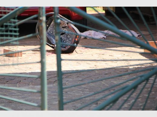 Callum’s car seat lies empty in the driveway after the attack.