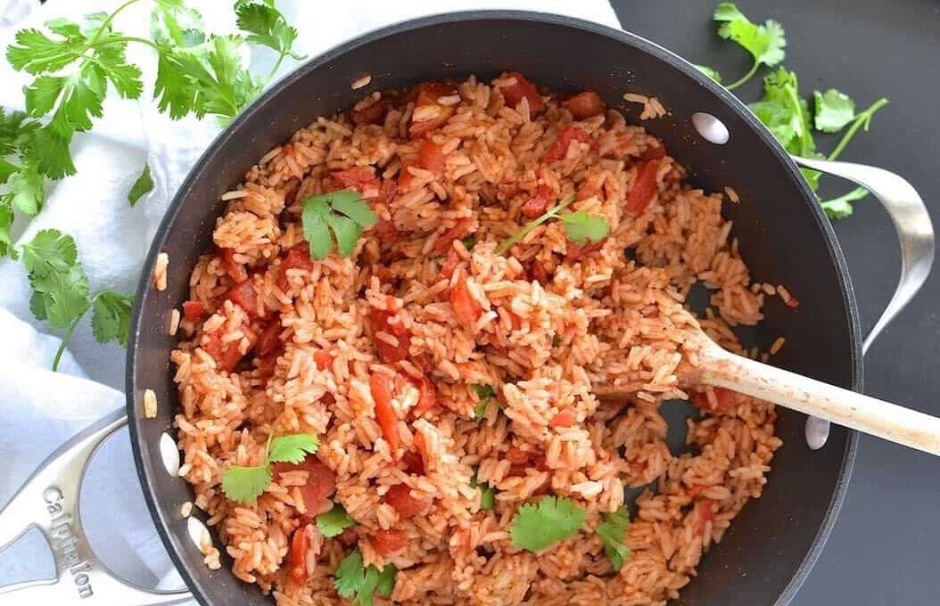 Recipe of the day Tomato garlic Spanish rice with sticky barbecue chicken