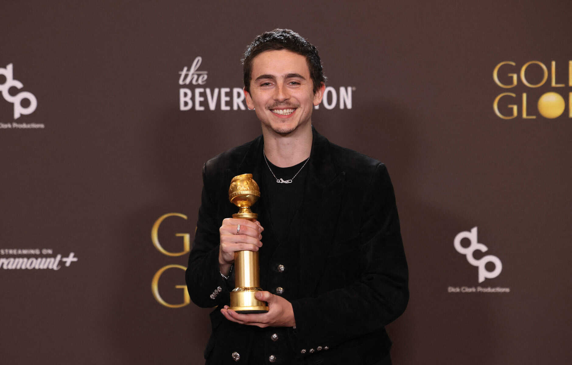 French-US actor Timothee Chalamet poses in the press room with the Best Actor in a Motion Picture  Musical or Comedy for "Marty Supreme" during the 83rd annual Golden Globe Awards at the Beverly Hilton hotel in Beverly Hills, California, on January 11, 2026. (Photo by Etienne Laurent / AFP) 