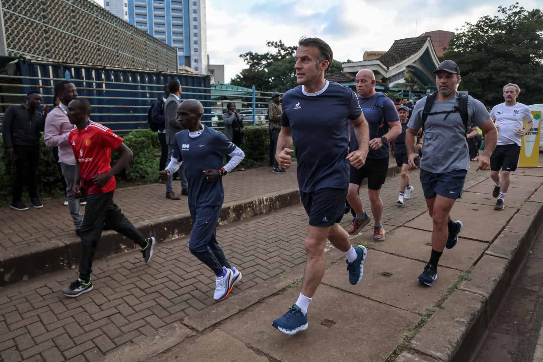 France's President Emmanuel Macron with Eliud Kipchoge